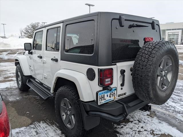 Used 2013 Jeep Wrangler Unlimited Freedom Edition with VIN 1C4BJWDG4DL580549 for sale in Mankato, Minnesota