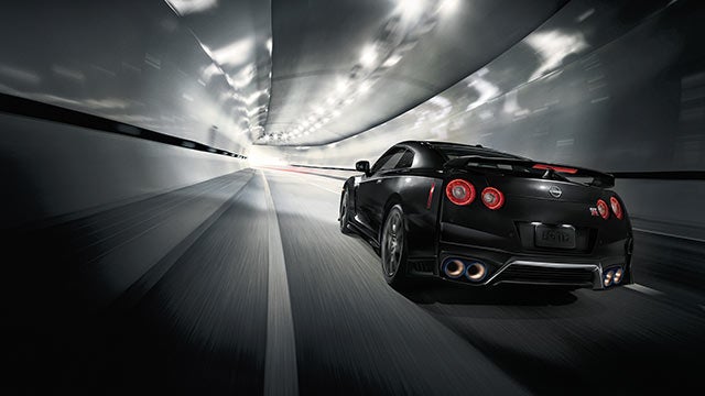 2023 Nissan GT-R seen from behind driving through a tunnel | Mankato Nissan in Mankato MN